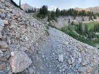 Near the top of the Giant Staircase. Mount Timpanogos is the peak on the left, Bomber Peak is the next highest (apparent) rounded peak in the right third of the skyline, followed by North Timpanogos at the far right.