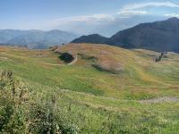 View of Timpanogos Basin. Left to right: Robert's Horn (center), The Shoulder (prominent cliff face), South Timpanogos (barely visible), and Mount Timpanogos (far right).