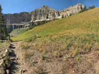 View of Hidden Lakes Basin below The Shoulder (right) and South Timpanogos (right of center) with East Peak (below sun)